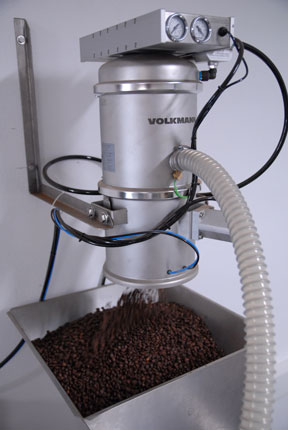 Volkmann pneumatic vacuum conveyor discharging coffee
